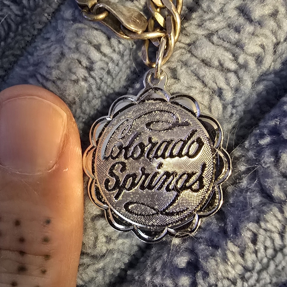 EUC vintage sterling silver Colorado Springs pendant charm